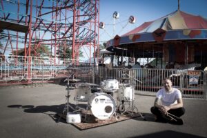 Patrick Blakley at his White Noise Drumset at Sylvan Beach