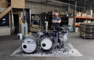 Time Machine drumset with Patrick Blakley standing