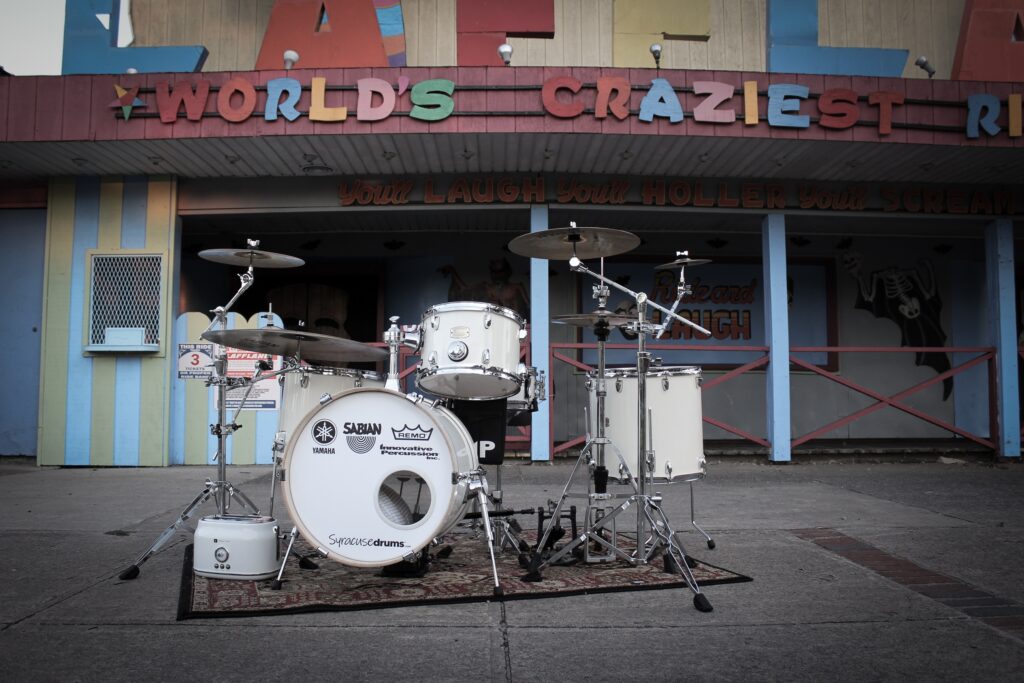 White Noise drumset in front of Laffland