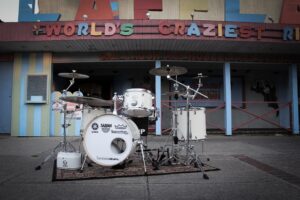 White Noise drumset in front of Laffland