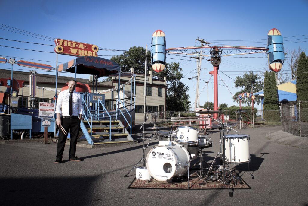 Patrick Blakley with drumset at Sylvan Beach